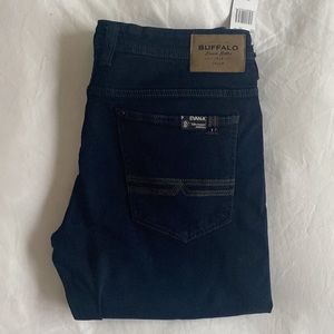 Slim straight stretch dark denim. 33x34. Never worn. Retail: $109